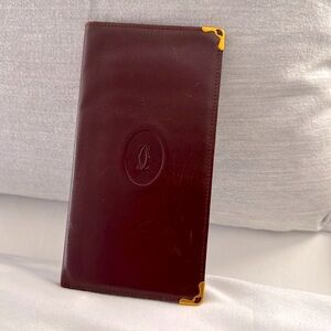 Cartier Long Wallet Checkbook style 7 card & 2 bill slots. Burgundy color.